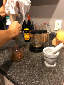 Straining out plant material